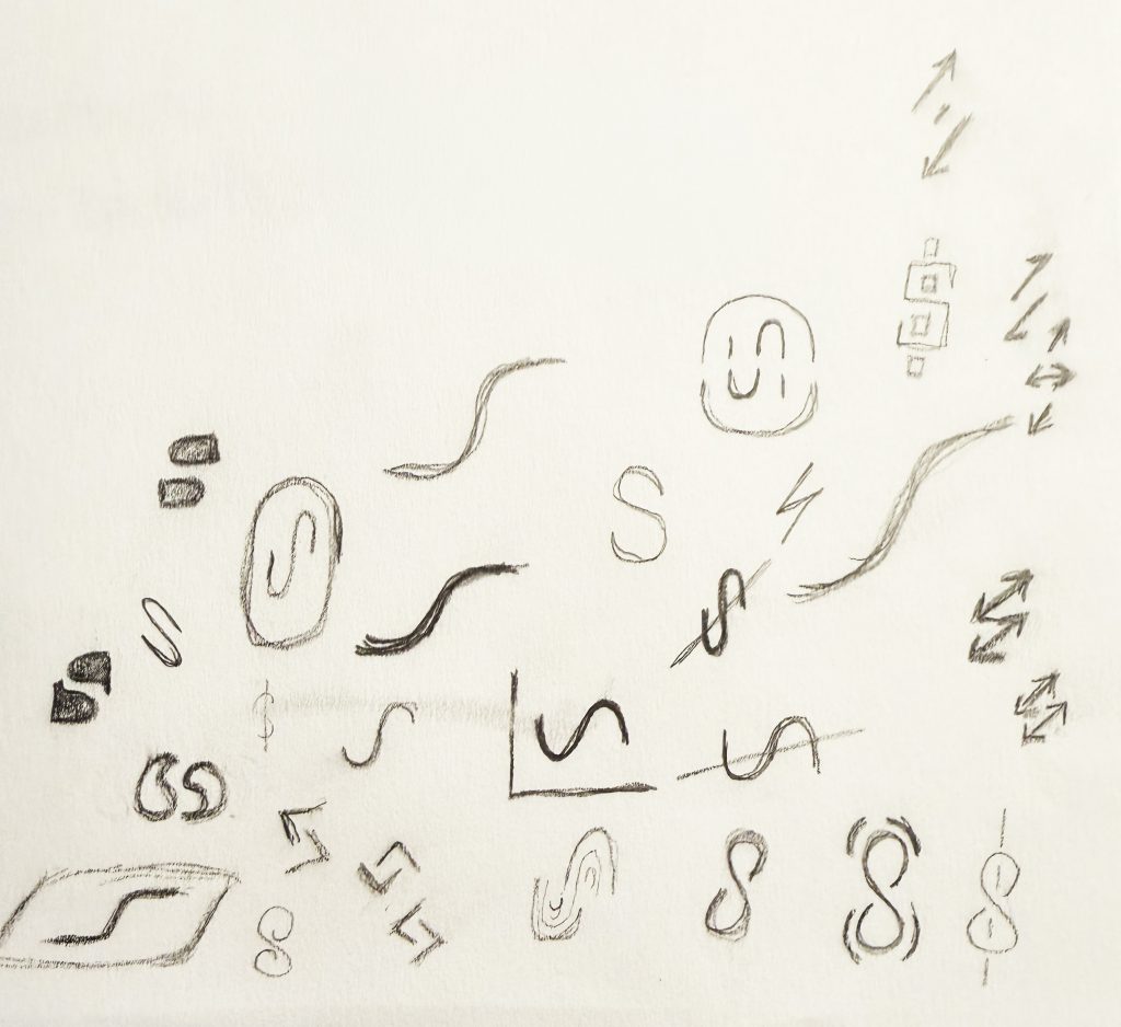 Early pencil sketches exploring arrow and quotation-mark concepts for the Sagac icon