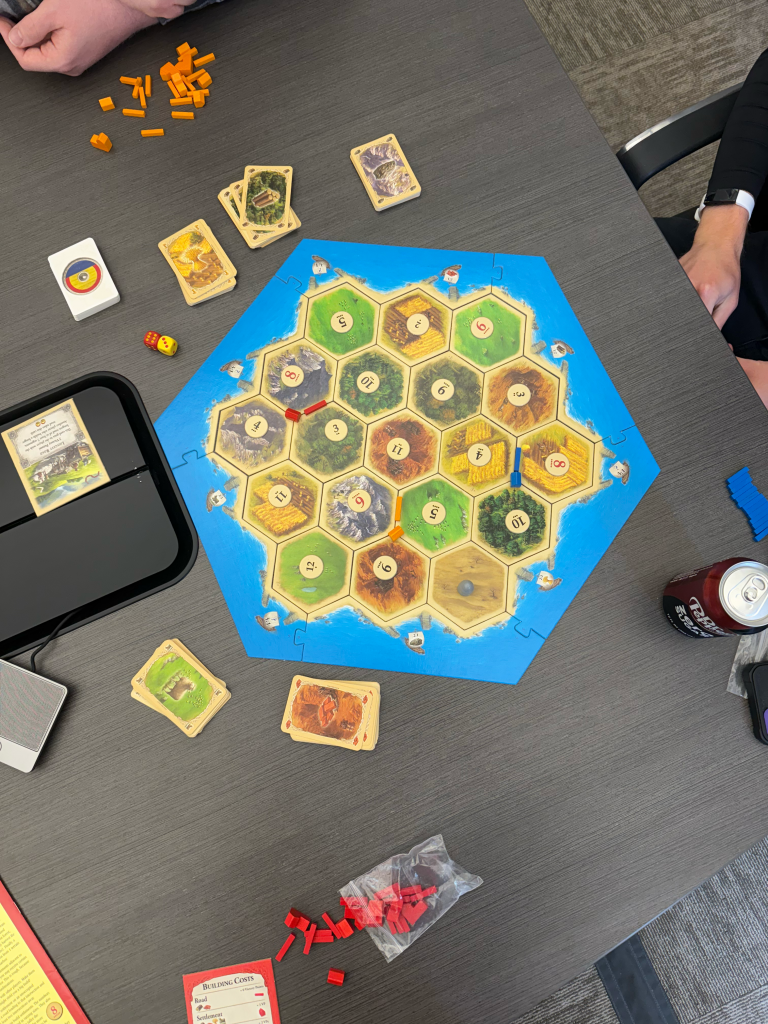 Initial ideation session over a game of Catan